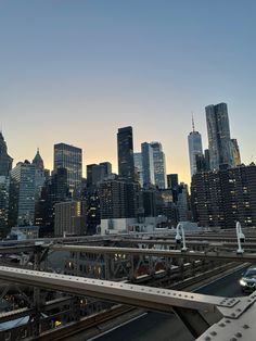 the city skyline is lit up at night