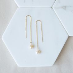 Everyday White Threader Earrings, Minimalist Long Drop Pearl Earrings With Ear Wire, Everyday Linear Pearl Drop Earrings, Everyday Pearl Drop Linear Earrings, Minimalist White Threader Earrings For Everyday, Everyday Linear Drop Earrings With Pearl, Everyday Linear Drop Earrings With Pearl Detail, Dainty Long Drop Pearl Earrings For Everyday, Everyday Dainty Dangle Linear Earrings