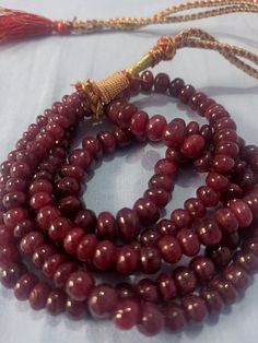 19''AAA 741 Carat Natural Ruby Smooth Rondelle Gemstone Beads Necklace With Adjustable Code Necklace Stone : Ruby Natural Shape :- Smooth rondelle Necklace - 19 inch 2 line string Size :- 4mm to 10mm Weight :- 741 carat Polish :- Handmade color - Red Polish :- Handmade makes a great gift for your loved ones. Click below to see live stock: https://www.etsy.com/au/shop/ShakugemsStore?ref=search_shop_redirect If for any reason you are not satisfied with your purchase. You can return it for a full r Festival Gemstone Bead Round Necklaces, Festival Round Gemstone Beads Necklace, Traditional Rondelle Beaded Necklace With Polished Beads, Traditional Single Strand Rondelle Jewelry, Traditional Round Beaded Necklaces For Formal Occasions, Traditional Round Beaded Necklace For Formal Occasions, Traditional Beaded Necklace For Formal Occasions, Traditional Round Gemstone Beaded Necklaces, Traditional Rondelle Gemstone Beads