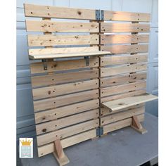 some wooden pallets are stacked on top of each other