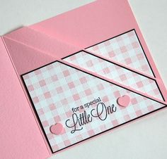 a pink and white card with some hearts on it that says for a special little one