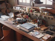 a workbench filled with lots of crafting supplies