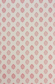 a red and white wallpaper with leaves on it