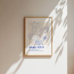 a framed poster hanging on the wall