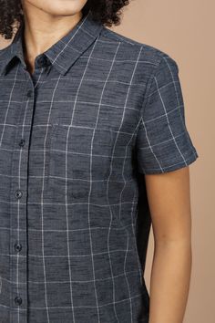 Returning this season, the Lana is a short sleeve button up with a simple chest pocket and cuffless sleeves. It has a relaxed fit that makes it a seamless layering piece. 100% Organic Cotton Sustainable Series Windowpane fabric with unique weave design Straight Fit Single chest pocket Machine wash cold with mild detergent. Line dry or tumble dry low. Warm iron if needed. Do not bleach. Plaid Short Sleeve Shirt For Everyday, Short Sleeve Shirt With Welt Pockets For Everyday, Lana Shirt, Overalls And Sweater, Company Gifts, Nursing Friendly, Bandana Scarf, Short Sleeve Button Up, Layering Pieces