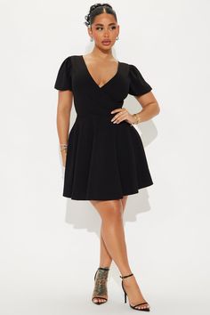 Available In Black. Mini Wrap Dress Surplice neckline Short puff sleeves Tie back Stretch Length = 33" 95% Polyester 5% Spandex Imported | Good Intentions Mini Wrap Dress in Black size XS by Fashion Nova Good Intentions, Mini Wrap, Back Stretches, Surplice Neckline, Black Wrap Dress, Mini Wrap Dress, Black Mini, Tie Back, Puff Sleeves