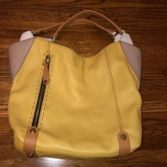 Yany Hobo Bag That Is The Perfect Compliment For Any Outfit. Has Lots Of Space And Is Very Cute. Lightly Used And In Good Condition. Comes With Dust Bag For Easy Storage And Travel. Chic Yellow Shoulder Bag, Yellow Satchel Shoulder Bag With Detachable Strap, Yellow Satchel Shoulder Bag With Zipper Closure, Yellow Satchel With Zipper Closure, Yellow Satchel Shoulder Bag, Yellow Double Handle Bag With Zipper Closure, Yellow Shoulder Bag With Removable Pouch, Yellow Rectangular Shoulder Bag With Zipper Closure, Rectangular Yellow Shoulder Bag With Zipper Closure