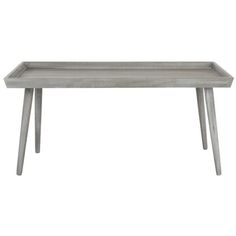 a grey wooden table with legs and a tray on the top that is shaped like a rectangle