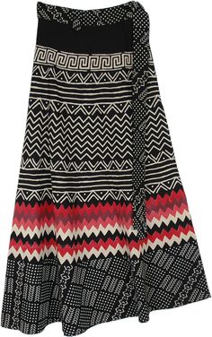 A casual street wear wrap around cotton skirt with bohemian style tribal print - the skirt has a black base with mainly white tribal style print on it, but also have a red and maroon zig-zag wave print near the bottom.  The wide hemline gives the skirt a flared and niche bohemian look. #tlb #WrapAroundSkirt #XLPlus #Printed #WrapSkirt #GypsyWrapSkirt #TribalWrap Black Bohemian Flowy Wrap Skirt, Bohemian Black Flowy Wrap Skirt, Black Flowy Bohemian Wrap Skirt, Black Cotton Bohemian Skirt, Black Bohemian Cotton Skirt, Bohemian Black Long Wrap Skirt, Black Long Bohemian Wrap Skirt, Traditional Black Cotton Skirt, Red Bohemian Wrap Skirt