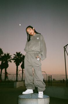 Sooo much love went in to making this sweatsuit, we had to drop a lil heart on our B logo just to show you! Buy this hoodie separate or get the whole fit by pairing with our B Love Sweats We custom made these with a more oversized look, so we recommend sizing down if you prefer your sweatsuits a lil more fitted. Oversized 90's bubble fit Poly cotton fleece blend Model is 5'0" and wearing a size medium Poses In Sweatshirt, Streetwear Fashion Campaign, Fitness Apparel Photoshoot, Selah Clothing, Atlanta Streetwear, Streetwear Editorial, Cool Photoshoot, Hoodie Street Style, 90s Tracksuit