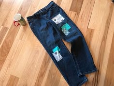 "Patched denim jeans women's size 10 petite, upcycled with patchwork on both front and back with a coffee theme in teal and dark blue colors.  This is a nice pair of jeans that I believe are cut small (more like an average size 4 or 6), so please note the measurements.  They have had patches applied to both the front and back in a coffee motif and would be a fun addition to your wardrobe! DETAILS: Size:  10 petite (see above - please note measurements) Brand:  Talbots Materials:  98% cotton, 2% spandex MEASUREMENTS: Waist:  31 inches Hips:  37 inches Inseam:  28 inches Front Rise:  10 inches Back Rise:  14 inches Circumference bottom of leg:  14 inches Be sure to check the size and measurements.  Sizing for clothing brands is often different! Hint:  To be sure this item will fit, lay your Fitted Cotton Jeans With Patchwork, Fitted Straight Leg Bottoms With Patches, Fitted Patchwork Jeans In Recycled Denim, Upcycled Fitted Jeans In Recycled Denim, Fitted Upcycled Jeans In Recycled Denim, Fitted Medium Wash Upcycled Jeans, Upcycled Fitted Casual Jeans, Casual Fitted Upcycled Jeans, Fitted Casual Upcycled Jeans