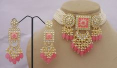 Occasion might be any, getting ready In a Sophisticated Manner Is Women'S Thing that they enjoy the most Indian Bridal Kundan Jewelry Set, Kundan Choker Necklace Earrings Set, Pink Beads Engagement Necklace Set, High Quality Necklace Jewelry Set ITEM DESCRIPTION Metal = Gold Plated Occasion = Wedding ,Party Wear, Bridal Color = Pink and White Size = Necklace Length = 20 CM, Necklace Weight = 72 Gram Earrings Size = 9 CM Earrings Weight = 118 gram each earrings 100% Satisfaction Guarantee: 1 Year Luxury Pink Kundan Necklace For Festive Season, Luxury Elegant Pink Kundan Necklace, Engagement Necklace, Kundan Choker Necklace, Kundan Jewellery Bridal, Kundan Jewellery Set, Engagement Necklaces, Kundan Jewelry, Kundan Choker