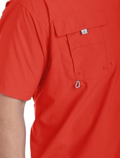 Designed specifically for the needs of anglers, this lightweight, durable nylon shirt dries fast, with mesh-lined cape vents at the back shoulder to keep you cool and built-in UV protection. Featuring Omni-Shade UPF 30 Sun protection, it also has a button-down collar, roll-tab sleeves, chest pockets, a rod holder and a shirttail hem. 100% Tactel nylon. Machine wash. Imported. Machine wash; imported Solid Camp Shirt With Pockets For Outdoor, Red Short Sleeve Tops For Outdoor, Casual Red Shirt For Outdoors, Casual Red Shirt For Outdoor, Rod Holder, Back Shoulder, Sport Shirt, Keep Your Cool, Button Down Collar