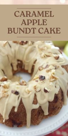 an apple bundt cake on a white plate with the words caramel apple bundt cake