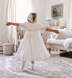 Petite Maison Kids. Made in Turkey. Charming white linen and embroidered lace dress with a large tie bow in the back. Composition: 70% Cotton, 30% Linen. Machine wash. Iron for the best look. Matching Mom version, romper style, and hair accessories available!