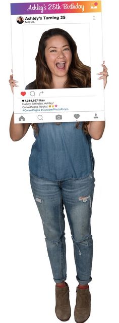 a woman in overalls holding up a tweet with an image of her face on it