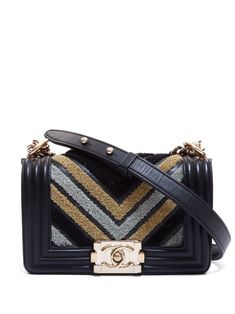 circa 2019 black/silver-tone/gold-tone calf leather chevron pattern signature gourmette-chain shoulder strap front flap closure signature Boy push-lock fastening main compartment internal slip pocket internal logo patch leather lining gold-tone hardware Serial Number: 27168045 This item comes with an original authenticity seal. Condition: EXCELLENT. This previously owned item is in near-perfect condition with no signs of damage or use. Tone Calves, Chanel Shoulder Bag, Shopping Chanel, Chanel 2, Chanel Boy, Demi Fine Jewelry, Pump Sandals, Ballet Flat Shoes, Chanel Handbags