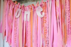 pink and orange streamers with the word 2013 hanging from it's front door