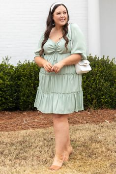 Don't you love how cute this dress is! The pistachio color is perfect for spring and the cinched bust with a tie is so cute! The loose, flowy, tiered style is so flattering on everyone and the bubble sleeves are so sweet! Style this cutie with some neutral heels and a fun accessory for the perfect look! 100% Polyester Green Tiered Mini Dress For Brunch, Spring Solid Color Tiered Mini Dress, Green Tiered Dress With Ruffle Hem For Vacation, Spring Sage Dresses For Brunch, Green Tiered Dress For Garden Party, Casual Flowy Solid Tiered Dress, Casual Green Tiered Dress For Vacation, Green Flowy Mini Dress With Ruffle Hem, Green Tiered Vacation Dress