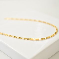 This beautiful Chain Link Necklace is made from 14K gold-filled paperclips linked together to form a necklace. This design is very modern, giving it a unique and stylish look. This necklace is a great way to add a touch of personality to any outfit and to show your appreciation for the everyday things that make life beautiful. Gold Filled Chain Link Necklace Details: Metal: 14K Gold-Filled Hypoallergenic, Tarnish-free, Waterproof & Sweatproof Perfect your Parure by layering it with our Sunbeam C Modern Gold Plated Paperclip Chain Bracelet, Minimalist Gold Plated Chain Necklace With Rectangular Links, Minimalist Gold Paperclip Bracelet With Gold Chain, Gold Paperclip Chain Necklace With Box Chain, Minimalist Gold Plated Bracelet With Rectangular Links, Dainty Gold Paperclip Chain Necklace, Gold Paperclip Bracelet With Figaro Chain As Gift, Gold Paperclip Bracelet With Figaro Chain Links, Gold Minimalist Paperclip Link Bracelet