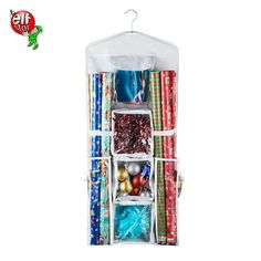 the hanging storage bag is filled with christmas presents