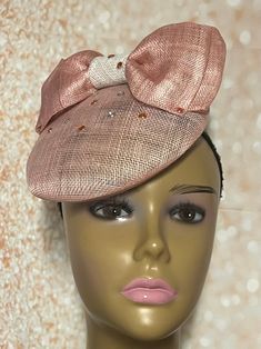 Light Pink Sinamay Fascinator Half Hat for Church head covering, Tea Party, Wedding, and other Special Occasions  Accented with double sinamay bows and rhinestones. The hat is affixed to the head via a hat string. 7 inches in diameter  Handmade Gifts for mom, sister, wife, or yourself. SHIPPING  All items for free shipping will be shipped via USPS FIRST CLASS MAIL. Adjustable Mini Hat For Kentucky Derby Party, Adjustable Bow Fascinator For Party, Adjustable Party Fascinator With Bow, Adjustable Fascinator With Structured Crown For Party, Brimmed Party Costume Hats And Headpieces, Adjustable Mini Hats For Royal Ascot Party, Party Hat With Bow And Curved Brim, Adjustable Short Brim Fascinator For Evening, Party Hat With Bow For Royal Ascot