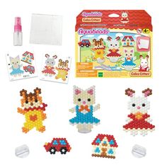 an assortment of toys and stickers on a white background