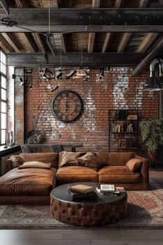 a living room filled with furniture and a large clock mounted to the wall above it