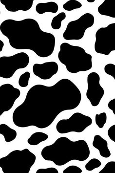 a black and white animal print pattern that looks like it has spots on the skin