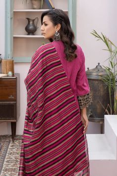 Brand: La RosaaProduct Code: LE-24-06Collection: La Rosaa Spring Summer Ready to Wear CollectionFabric: Dobi Lawn DESIGN DETAILS: In the resplendent glow of Eid night, 3 piece ensemble emerges as a beacon of allure. Crafted from luxurious weaved khadi dobi lawn fabric, the three-piece magenta attire emanates elegance and sophistication. The shirt, adorned with a striking Indian neckline with gold embroidered plaquette on delicate black organza, captures attention with its intricate detailing. Th Summer Ready To Wear, Lawn Design, Organza Sleeves, Lawn Fabric, Fabric Stores Online, Summer Ready, Jacquard Fabric, Designer Suits, Three Piece