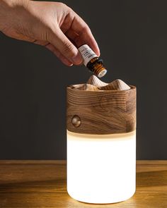 Inspired by the simplicity of travel and nature, the Nomad Lantern Lamp offers a portable yet stylish lighting solution. Its warm wooden top and handle evoke a sense of rustic charm, while the frosted base provides a soft, ambient glow perfect for any space. If you have any questions about our products, please get in touch with us and we will reply to you within 24 hours. Product Size With hand strap Model A Size: Dia 10cm x H 16cm / ∅ 3.9″ x H 6.3″ Without hand strap Model B Size: Dia 10cm x H 16cm / ∅ 3.9″ x H 6.3″ Details Material: Metal, Wood, Acrylic. Light source: Integrated LED. Kelvin range: Warm Light (3000K), Neutral Light (4000K), Cool Light (6000K). Power: ~3W Voltage: AC 110-240V. Moisture resistance: IP 20 Damp-rated not waterproof, for indoor use only. Environment: Indoor. B Crystal Chandelier Kitchen, Lantern Table Lamp, Hallway Wall Lights, Portable Lighting, Tiffany Style Table Lamps, Chandelier Art, Recessed Wall Lights, Flushmount Ceiling Lights, Arc Lamp