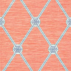 an orange and white fabric with geometric designs