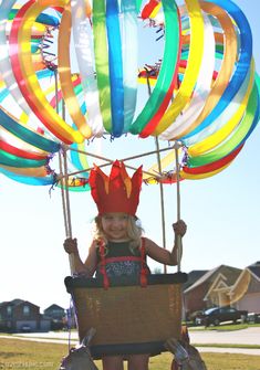 Float away in this awesome DIY hot air balloon Halloween costume. #kidscostume Hot Air Balloon Costume, Balloon Costume, Homemade Costumes For Kids, Most Creative Halloween Costumes, Kids Homemade, Halloween Costume Contest