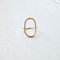 This hammered open circle ring is made from 16g wire. It comes in either sterling silver or gold filled. It's simple and understated....perfect for every day wear! Circle dimension is approximately 23 x 14 mm Please convo me if you want a custom size. I'll be happy to accommodate you! Everyday Minimalist Hammered Midi Rings, Minimalist Hammered Stackable Rings In Recycled Gold, Minimalist Hammered Ring With Open Band, Minimalist Hammered Open Band Ring, Minimalist Hand Forged Gold Midi Rings, Everyday Hammered Open Midi Rings, Minimalist Hand Forged Open Midi Rings, Minimalist Hammered Midi Rings As Gift, Dainty Hammered Open Midi Rings