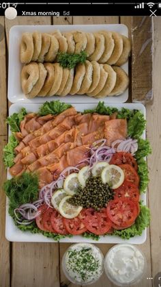 two platters filled with different types of food