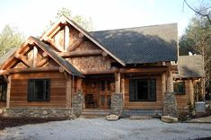 a log home with stone and wood accents