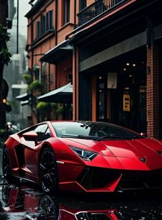 a red sports car parked in front of a tall building on a wet city street