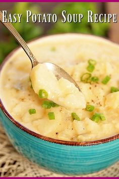 a blue bowl filled with mashed potatoes and garnished with chopped green onions