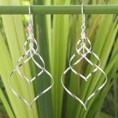 Modern Sterling Silver Dangle Earrings - Chiang Mai Chimes | NOVICA Single Diamond Necklace, Earrings Fancy, Metal Ideas, Modern Silver Jewelry, Shiny Earrings, Round Dangle Earrings, Silver Chandelier, Chandelier Style, Silver Dangle Earrings