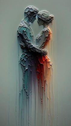 an abstract painting of two people hugging each other with colorful paint dripping down the wall