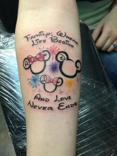 a person with a tattoo on their arm that says family, queen, life begins and love never ends