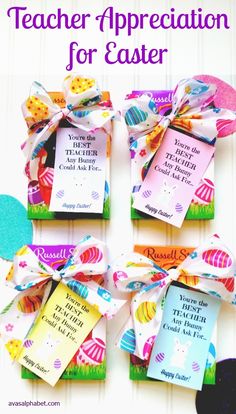 teacher appreciation gift idea for easter with colorful paper tags and bows on the top of them