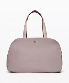 Go Getter Bag 2.0 | Women's Bags | lululemon Sleek Travel Bags With Removable Pouch, Sleek Satchel Bags For Travel, Sleek Travel Satchel Bag, Sleek Travel Bags With Top Carry Handle, Sleek Travel Bag With Top Carry Handle, Modern Gym Bag With Adjustable Strap, Sleek Travel Tote Bag, Sleek Large Capacity Shoulder Bag For Travel, Lululemon Rectangular On-the-go Bag