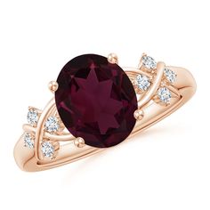 This 14k rose gold ring features a striking rose-hued oval rhodolite in prong setting. The criss cross motifs are accentuated with glittering diamond accents on the shank. Rhodolite Garnet Ring, Criss Cross Ring, Diamond Glitter, 14k Rose Gold Ring, Cross Ring, 18k Yellow Gold Ring, Rhodolite Garnet, Solid Gold Rings, Reddish Brown