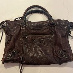 Used In Great Condition, Comes With Mirror And New Unused Tassel. Originally Purchased In Balenciaga Nyc Store. Minor Scuff On Corners. Olsen Twins Balenciaga Bag, Boujee Bags, Boho Rocker Chic, Balenciaga Classic City, Balenciaga Tote, Bottega Veneta Bag, Balenciaga Leather, Balenciaga Handbags, Motorcycle Bag