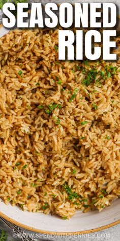 a white bowl filled with seasoned rice and garnished with parsley