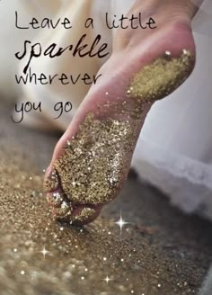 a person's foot covered in gold glitter with the words leave a little sparkle wherever you go