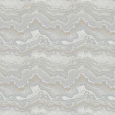 an abstract marble pattern in grey and white colors with gold highlights on the top right corner