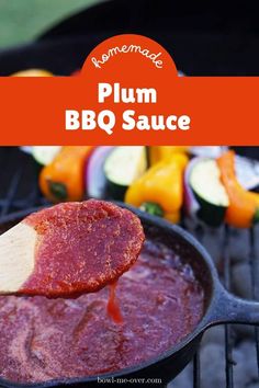 homemade plum bbq sauce in a cast iron skillet on an outdoor grill with vegetables