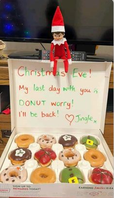 an elf is sitting on top of a box of doughnuts with the message christmas eve my last day with you don't worry i'll'll be back tonight